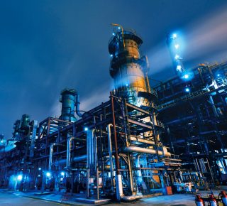 Oil Refinery, Chemical & Petrochemical plant abstract at night.
